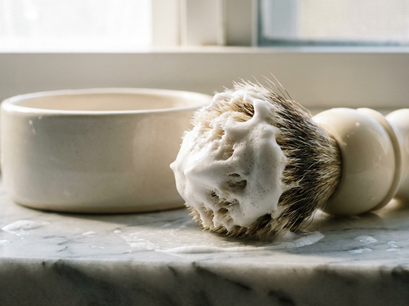 Shaving soap vs shaving cream compared with a loaded badger brush and lather
